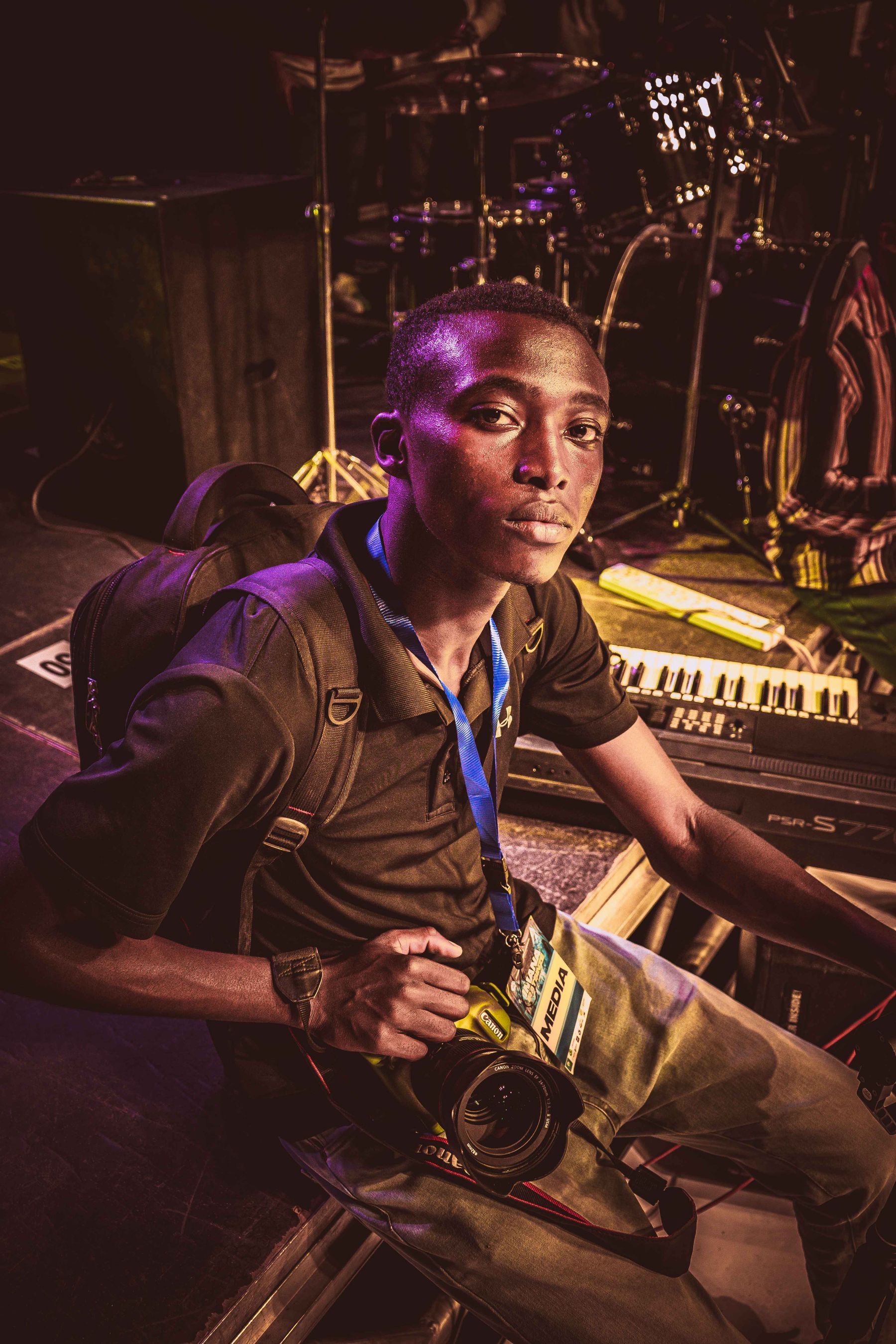A real concert photographer working beside the stage