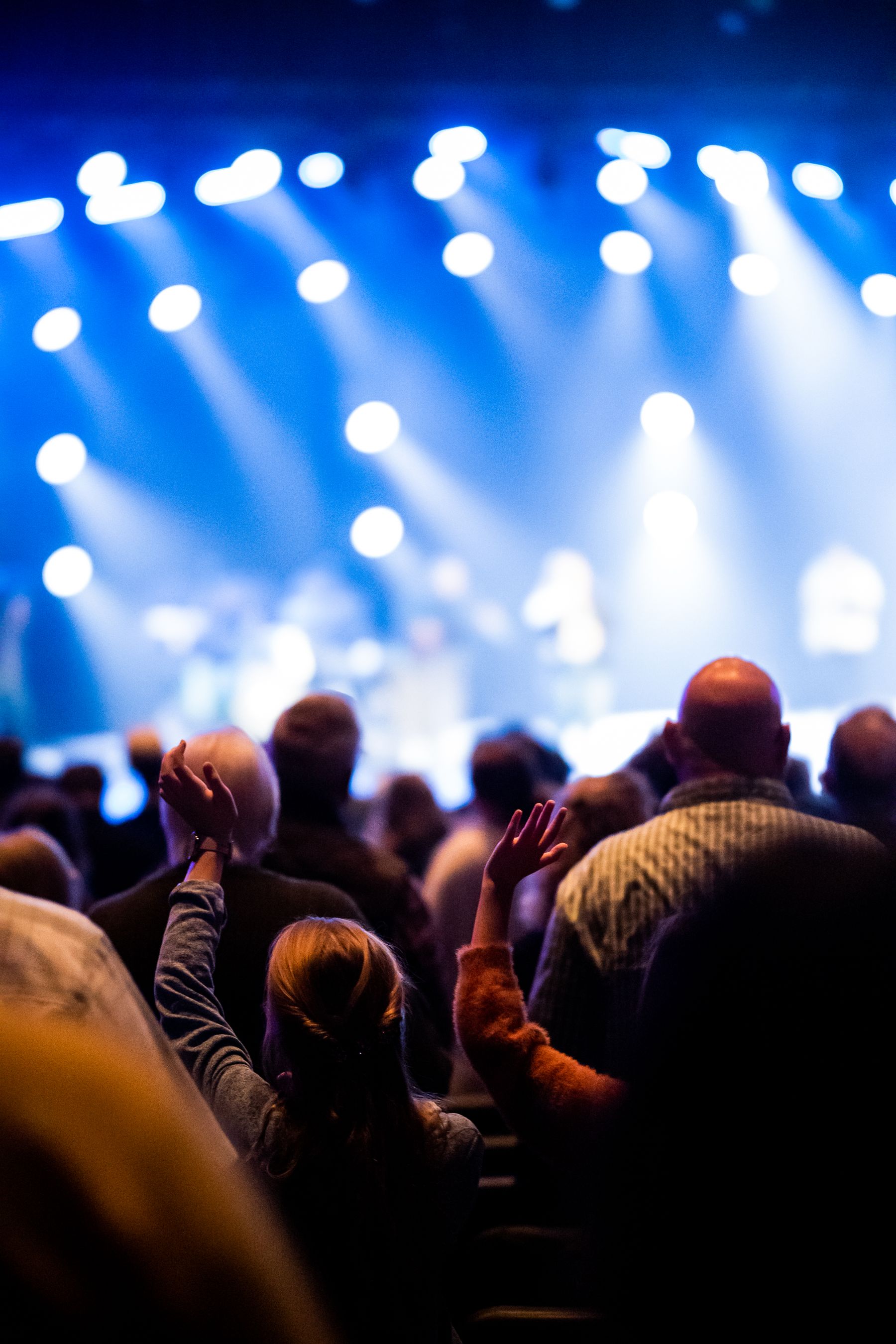 Real fans enjoying a live performance together
