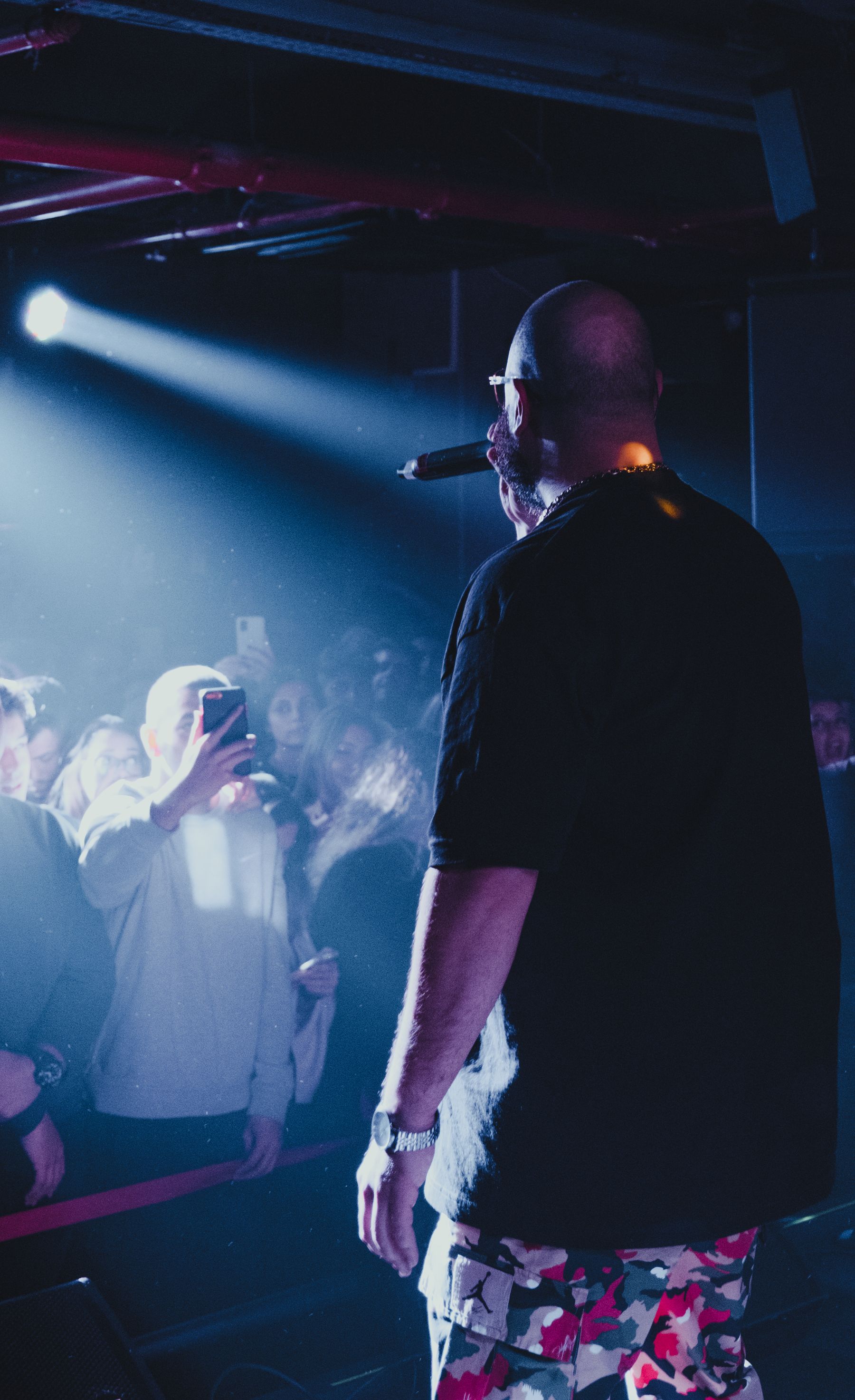A fan discovering and photographing a real live performance